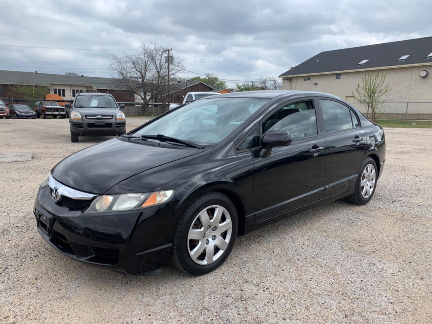 2010 Black /gray Honda Civic LX Sedan (19XFA1F56AE) with an 1.8L L4 SOHC 16V engine, Automatic transmission, located at 1830 North Belt Line Road, Irving, TX, 75061, (469) 524-0199, 32.834373, -96.993584 - Photo#4